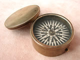 Early Victorian brass cased pocket compass with lid, circa 1840.